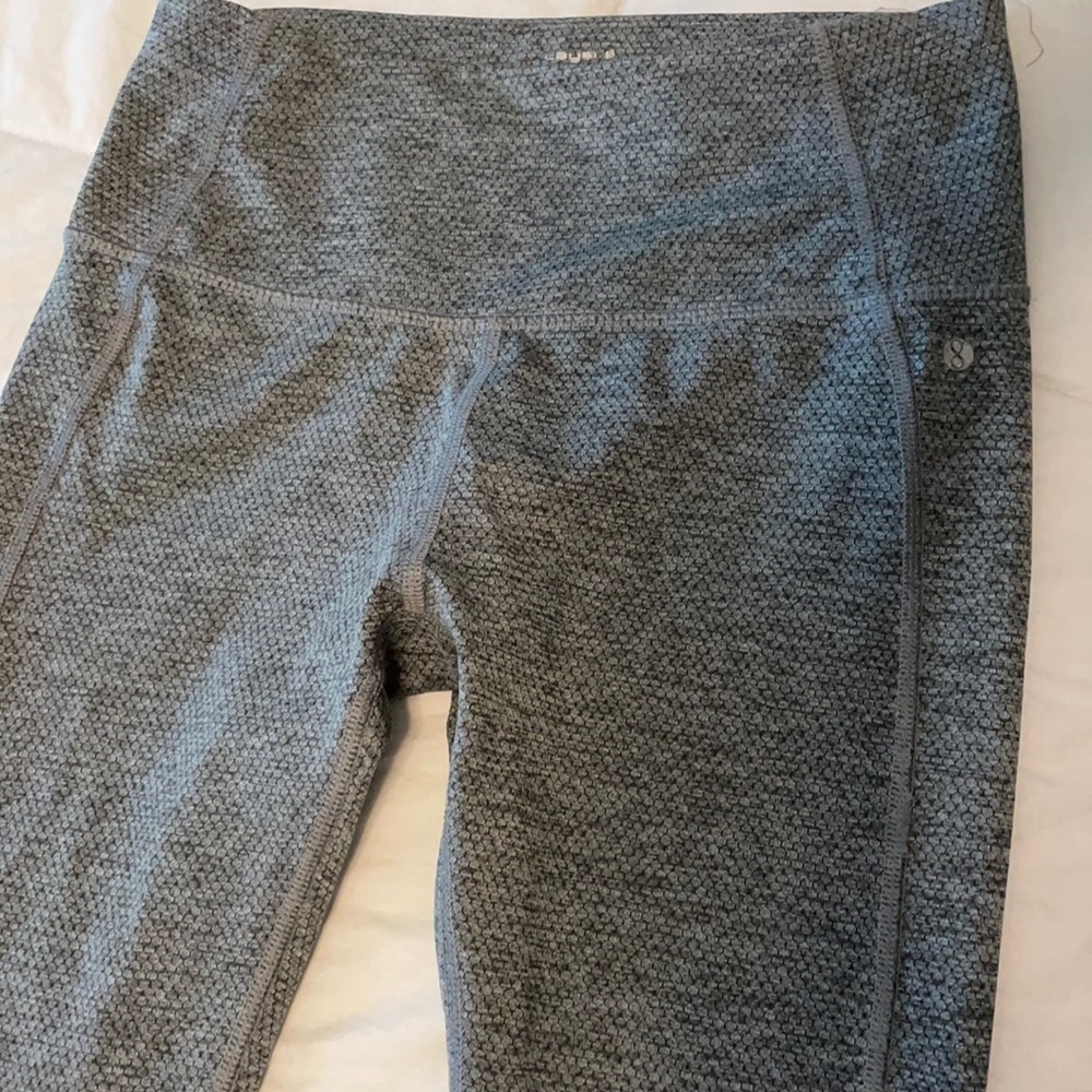 Yoga/workout pants. Dark grey color with pattern.
